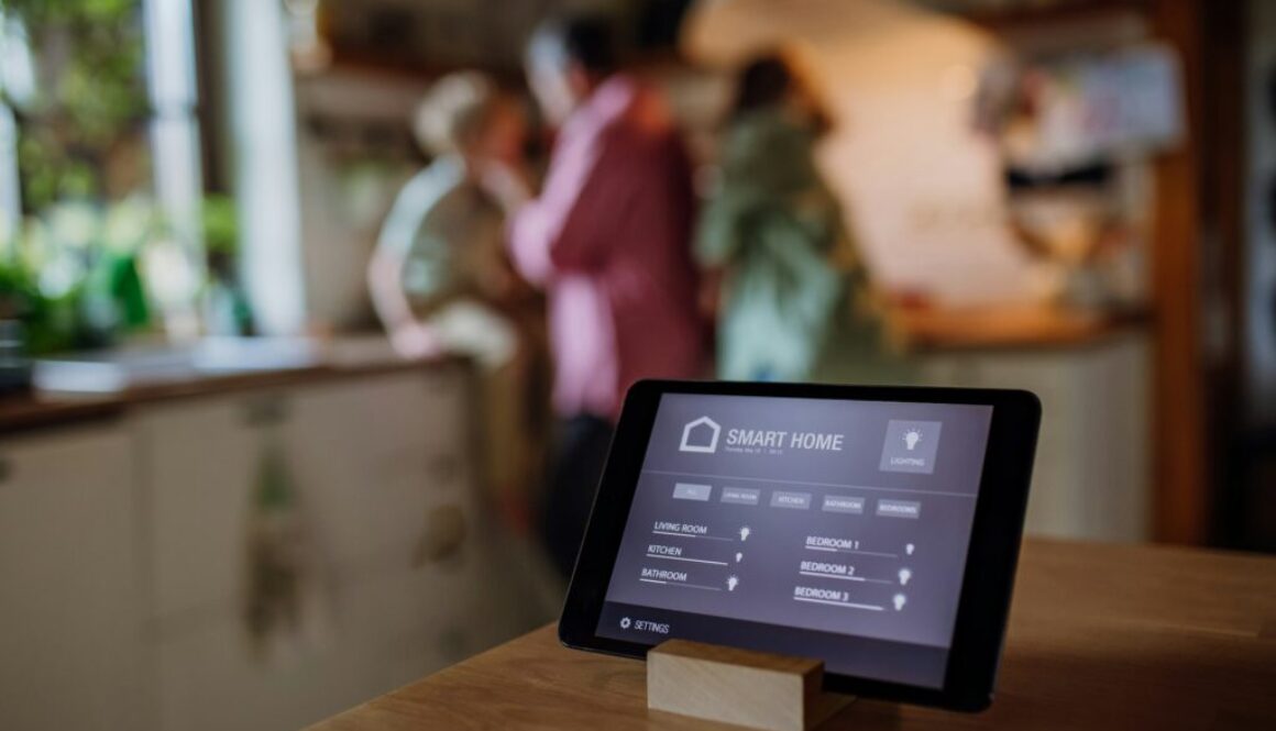 Close up of smart thermostat at home, adjusting, lowering heating temperature at home. Concept of